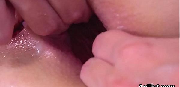  Foxy lezzie hotties are opening up and fist fucking butt holes
